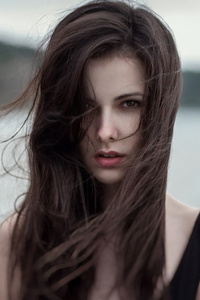 Hair In Face Sea Outdoors (240x400) Resolution Wallpaper