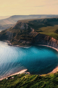 Hidden Turquoise Cove Along Dramatic Cliffs (320x568) Resolution Wallpaper
