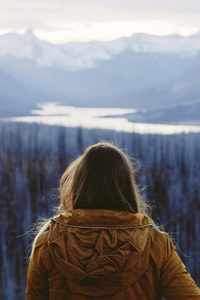 Hoodie Girl Brunette Looking At The Nature Landscape (720x1280) Resolution Wallpaper