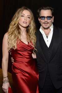 Johnny Depp And Amber Heard (240x400) Resolution Wallpaper