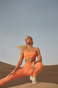 Khloe Kardashian Fabletics Collaboration 2025 (720x1280) Resolution Wallpaper