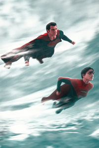 Kryptonian Kin Superman And Supergirl (540x960) Resolution Wallpaper