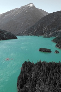 Lake In The Middle Of Mountains (720x1280) Resolution Wallpaper