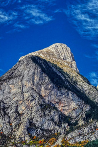 Majestic Stone Peaks Under Deep Blue Sky (240x320) Resolution Wallpaper