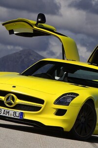 Mercedes Benz SLS AMG Yellow (640x960) Resolution Wallpaper