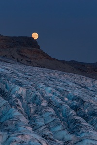 1280x2120 Moon Rising Over A Glacier With Mountains
