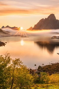 Norway Scenery Mountains Reine Fog Sun Bay 4k (1125x2436) Resolution Wallpaper
