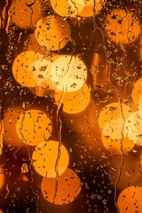 Rain Drops Orange Bokeh Lights 5k (320x568) Resolution Wallpaper