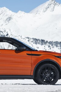Range Rover Convertible In Snow Mountains