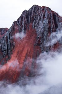 Red Mountain Peeking Out Behind The Clouds Cusco Peru (1080x2160) Resolution Wallpaper
