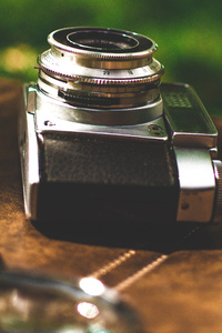 Retro Old Camera Magnifying Glass (1440x2960) Resolution Wallpaper