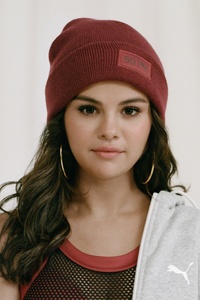 Selena Gomez 4k Puma (640x960) Resolution Wallpaper