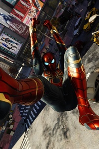 Spiderman Iron Suit Shooting Web (1280x2120) Resolution Wallpaper