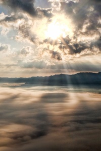 Sun Rays Through Clouds Mountains (480x854) Resolution Wallpaper