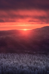 Sun Setting Over A Mountain 5k (1125x2436) Resolution Wallpaper