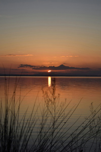 Sun Setting Over Calm Lake (1080x1920) Resolution Wallpaper