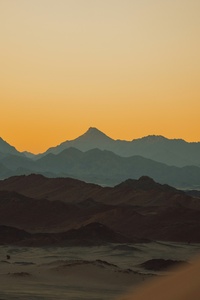 Sun Setting Over The Mountains In Desert (240x400) Resolution Wallpaper