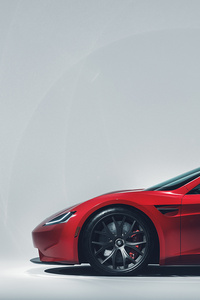 Tesla Roadster Charging (320x480) Resolution Wallpaper