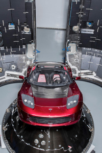 Tesla Roadster Into Falcon Heavy (640x960) Resolution Wallpaper