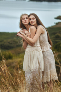 Two Women In Amidst Nature Beauty (480x854) Resolution Wallpaper