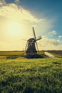 Windmill In Farmland Sunset View 5k (640x1136) Resolution Wallpaper