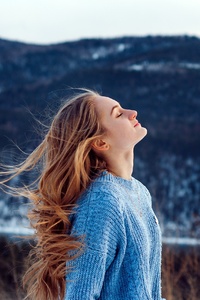 Windy Weather Snow Closed Eyes Girl (720x1280) Resolution Wallpaper