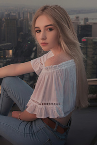 Women Blonde Sitting On Roof Tops 4k (320x480) Resolution Wallpaper