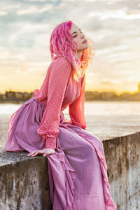 Young Girl With Pink Hair Watching Ocean (1125x2436) Resolution Wallpaper